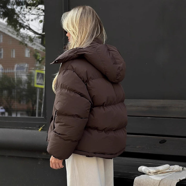Women's short-cut oversized quilted jacket with high stand-up collar and concealed snap button placket Amarae