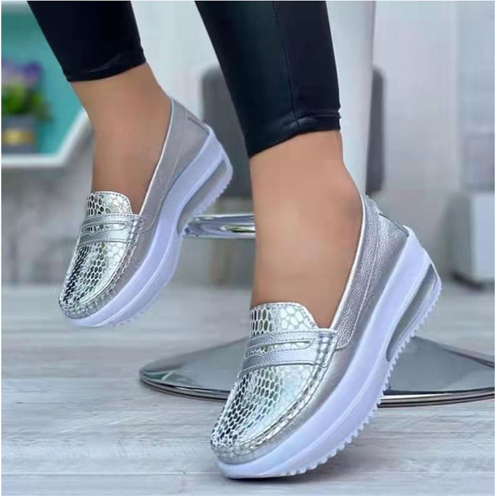 Women's comfortable Slip-On shoes with a stylish snake leather design and a cushioned sole Lune London
