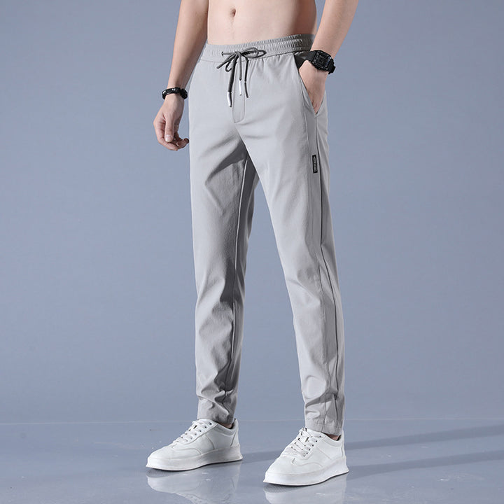 Men's sports pants with adjustable drawstring and zippered pockets on the sides Lune London