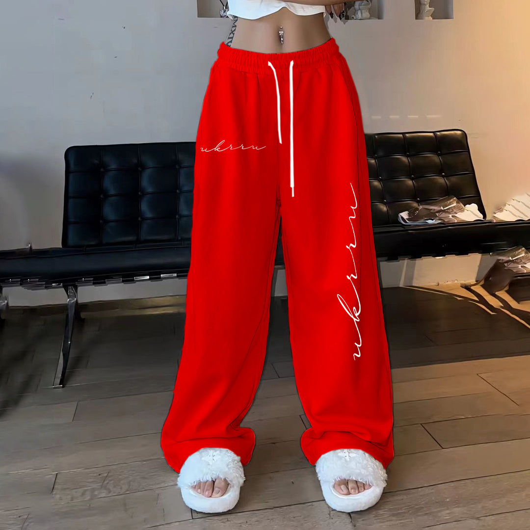 Women comfortable leisure trousers with elastic waistband and side print Chic & Stil