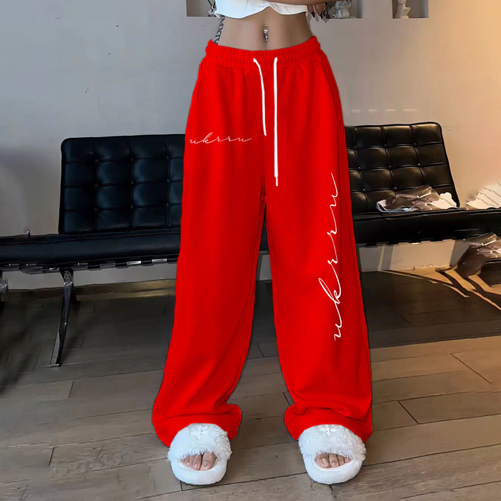 Women comfortable leisure trousers with elastic waistband and side print Chic & Stil