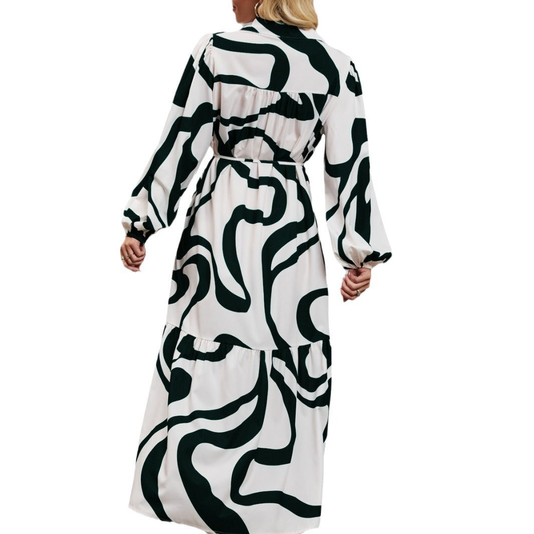 Long sleeve women's dress with trendy pattern and practical belt.