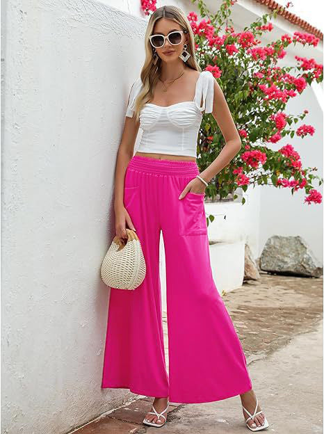 Wide palazzo pants for women with elastic waistband and practical pockets Lune London
