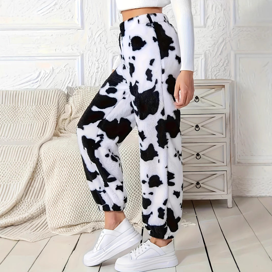 Ladies plush pants with a trendy cow spot pattern and elastic waist Lune London
