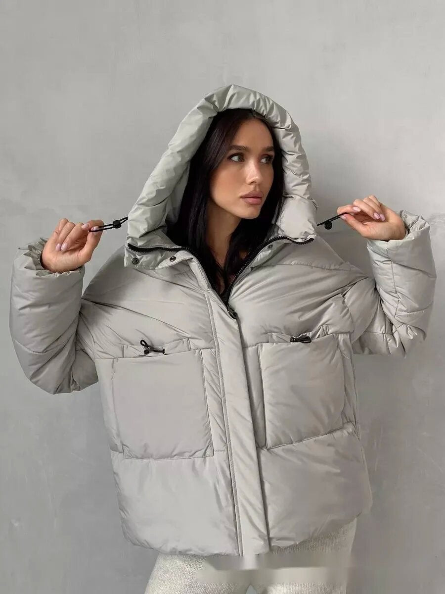 Sporty winter jacket for women with high collar and practical pockets Lune London