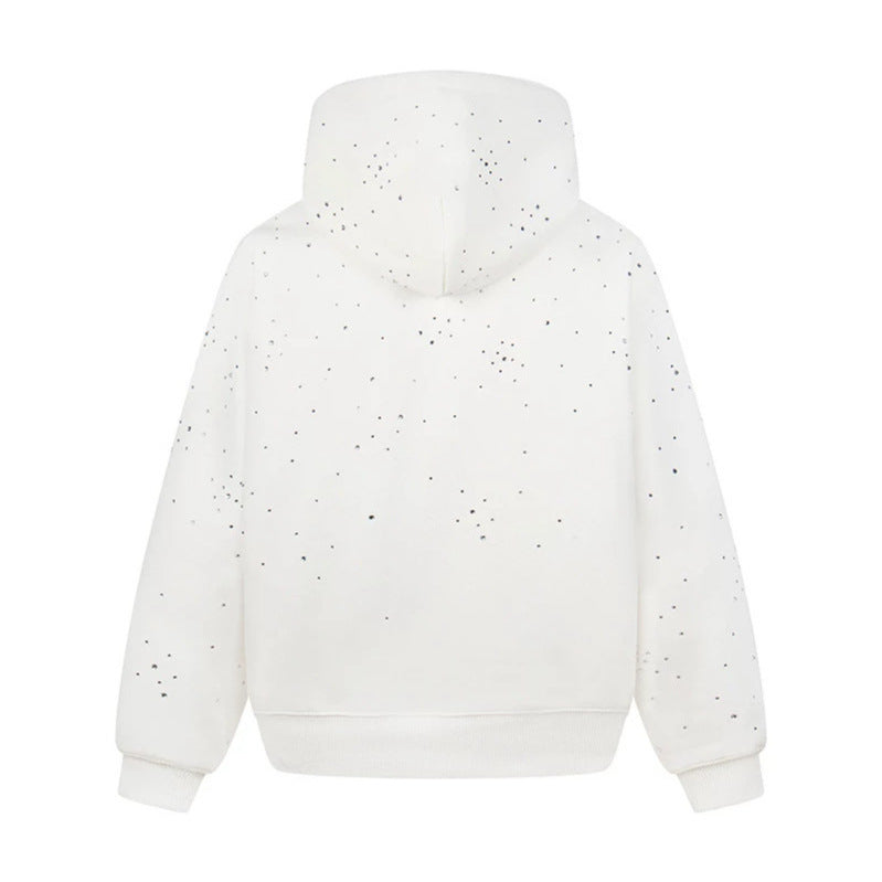 Women’s hoodie with statement print, metallic lettering and paint splatter look Amarae