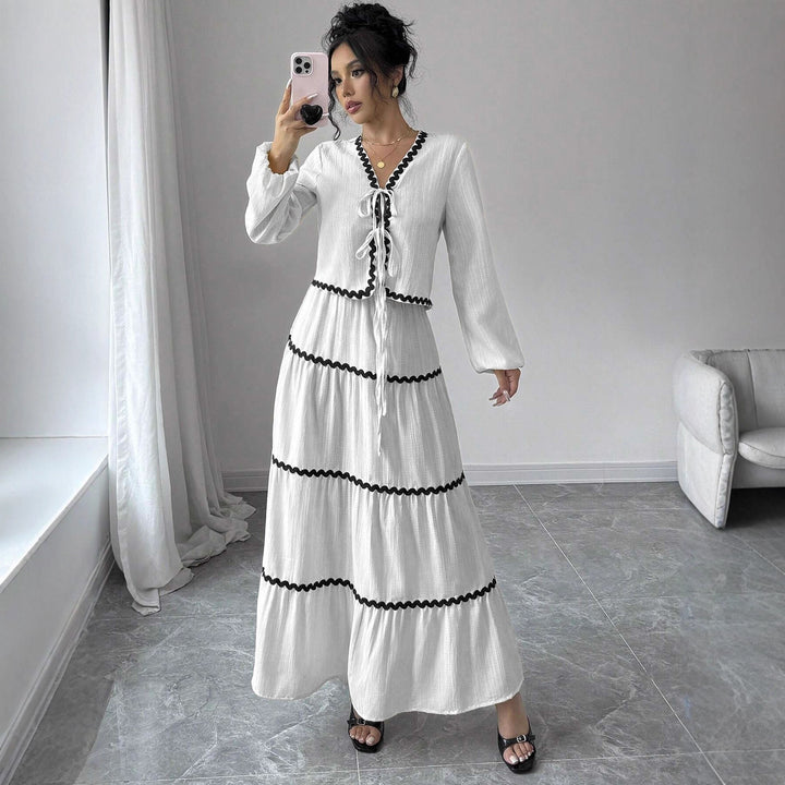Maxi dress for women with playful lace-up neckline and elegant ruffled skirt Lune London