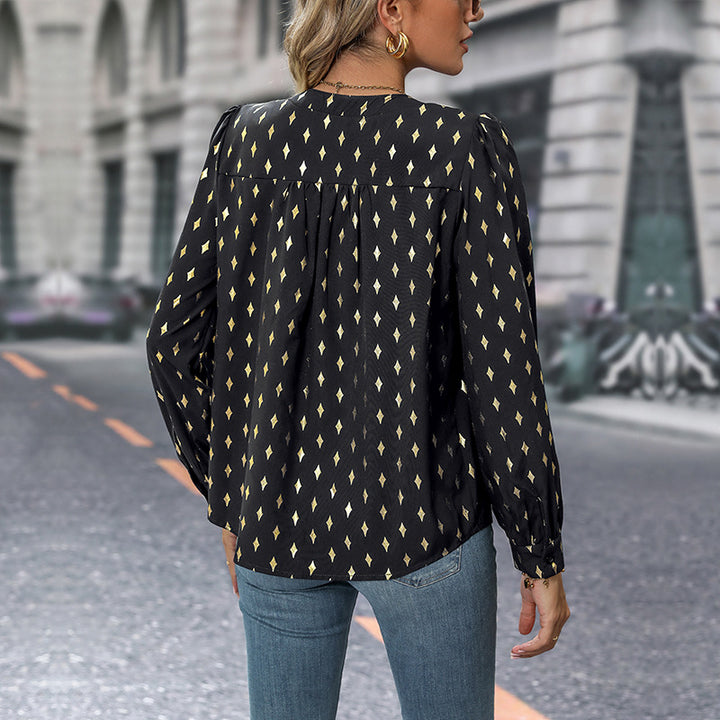 Ladies' blouse with elegant puff sleeves and decorative buttons Lune London