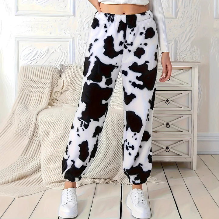 Ladies plush pants with a trendy cow spot pattern and elastic waist Lune London