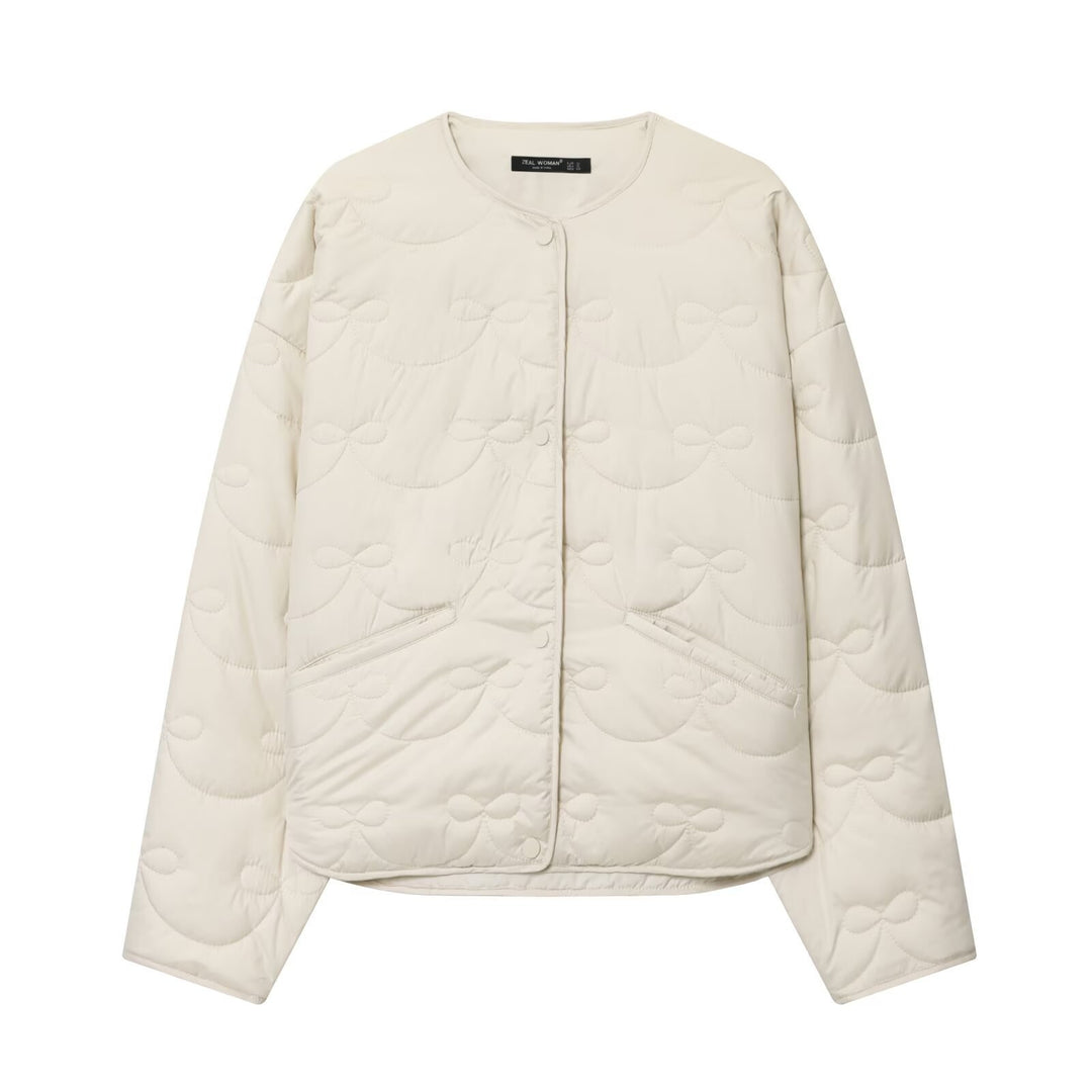 Women's short cut quilted jacket with round neckline and tonal bow quilting Amarae