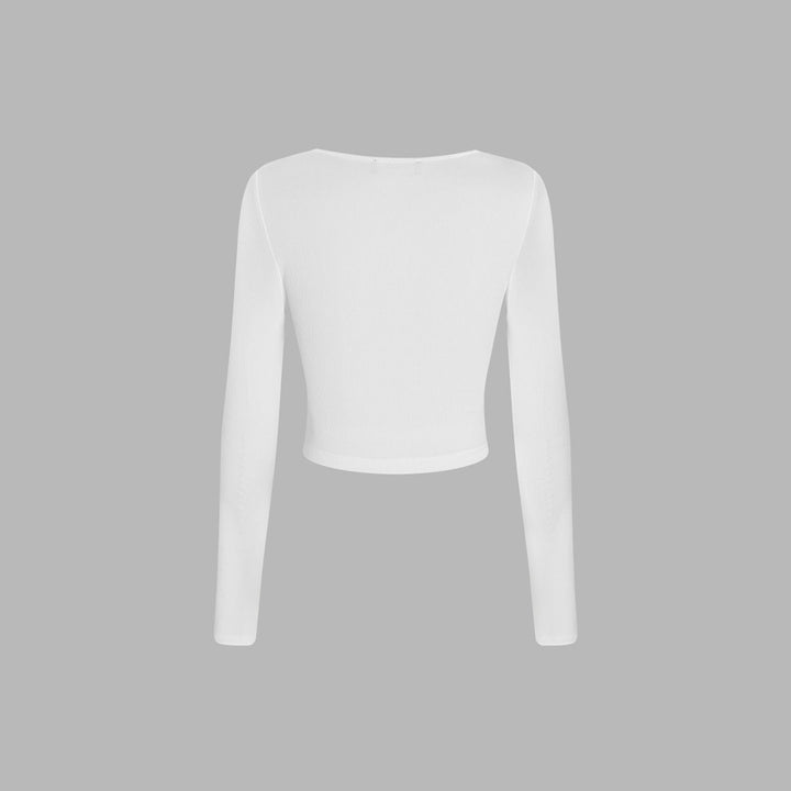 Chemise pour femmes à manches longues courte avec un design drapé sophistiqué et un col rond de mode Chic & Stil