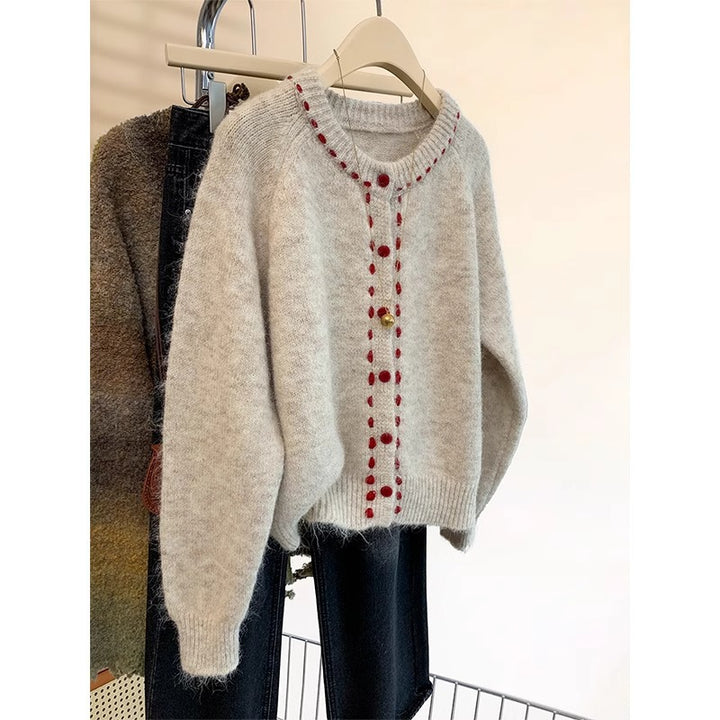 Pull en tricot douillet pour femmes avec détails de boutons colorés Chic & Stil