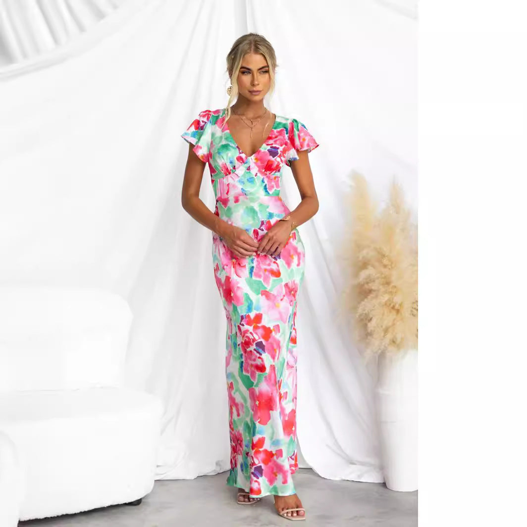 Women's maxi dress with floral design and flowing silhouette Lune London