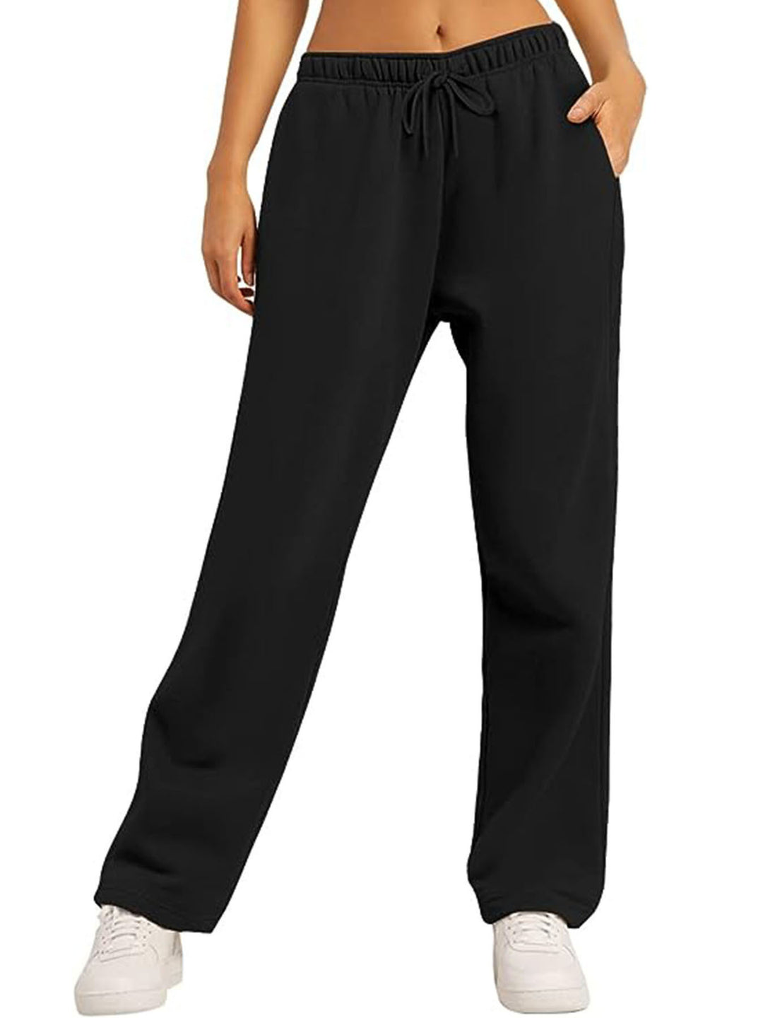 Women's loose-fitting leisure pants with elastic waistband and side pockets Chic & Stil