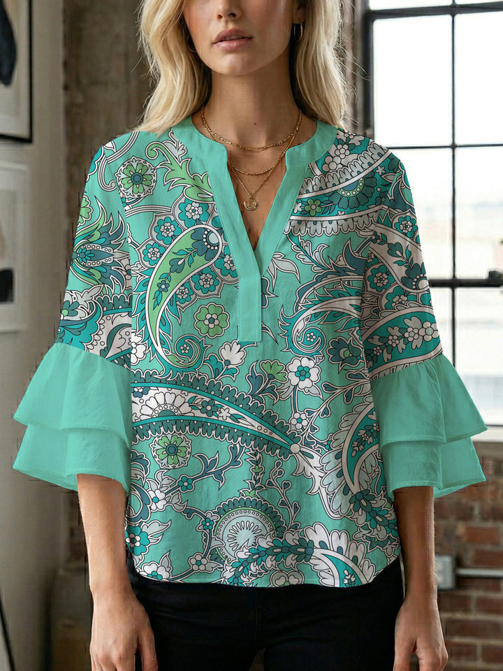 Ladies elegant blouse shirt with voluminous puff sleeves and graphic floral design Lune London