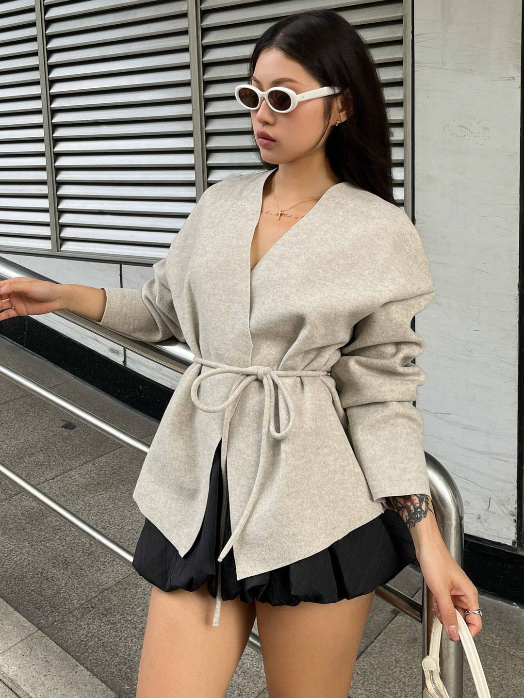 Elegant wrap coat for women with a fitted cut and trendy details Lune London