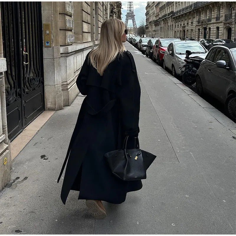 Ladies elegant long trench coat with modern cut and practical pockets Lune London