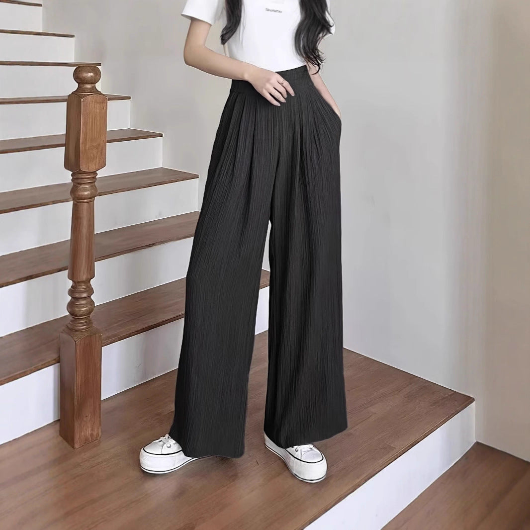 Wide pleated trousers for women with high pockets and elastic waist Lune London