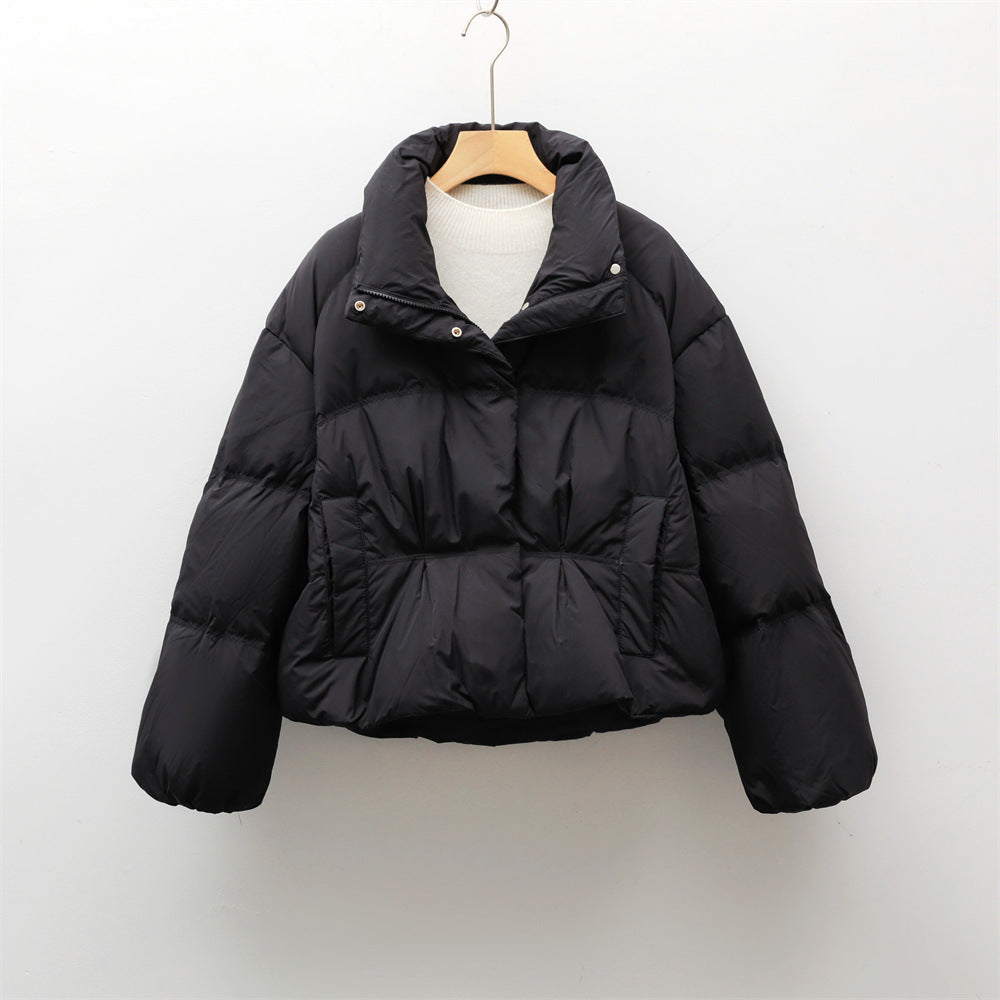 Short quilted jacket with high collar for women with practical pockets Lune London