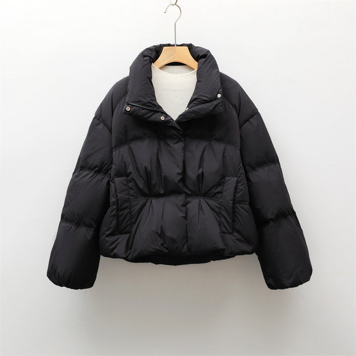 Short quilted jacket with high collar for women with practical pockets Lune London