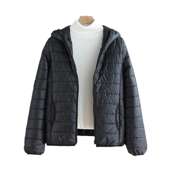 Ladies quilted transitional jacket with practical pockets and hood Amarae