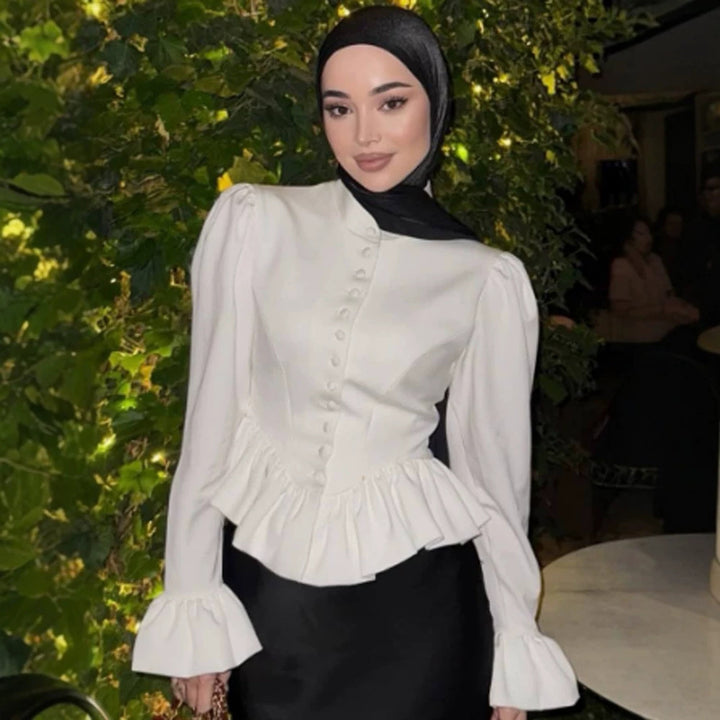 Ladies tailored peplum blouse with stand-up collar, covered button placket and puff sleeves Amarae