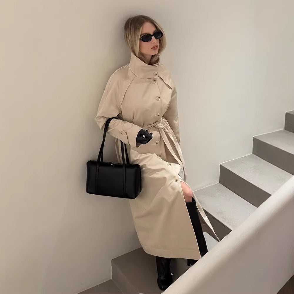 Ladies maxilength trench coat with high stand-up collar, double-breasted button placket and tie belt Amarae