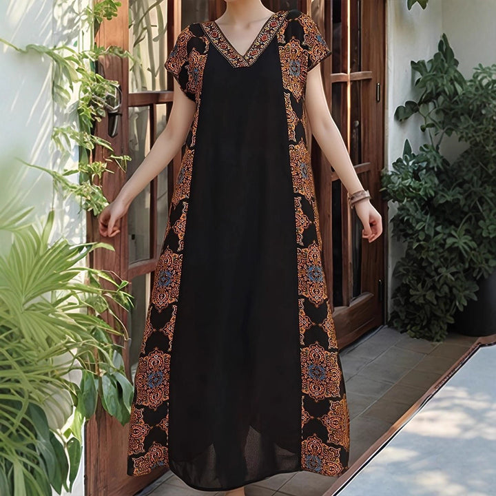 Maxi dress for women with elaborate embroidery details and a flowy fit Lune London
