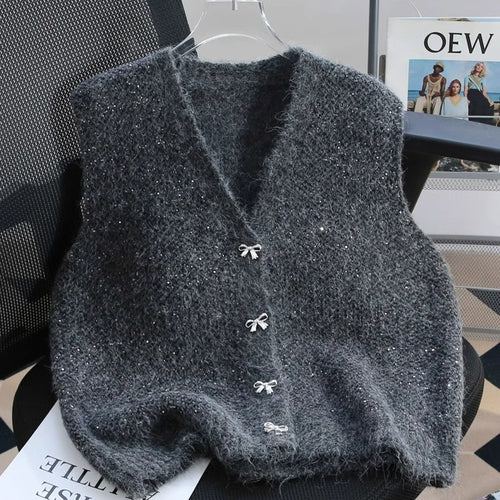 Gilet en tricot pour femmes avec accents scintillants et boutons décoratifs Chic & Stil