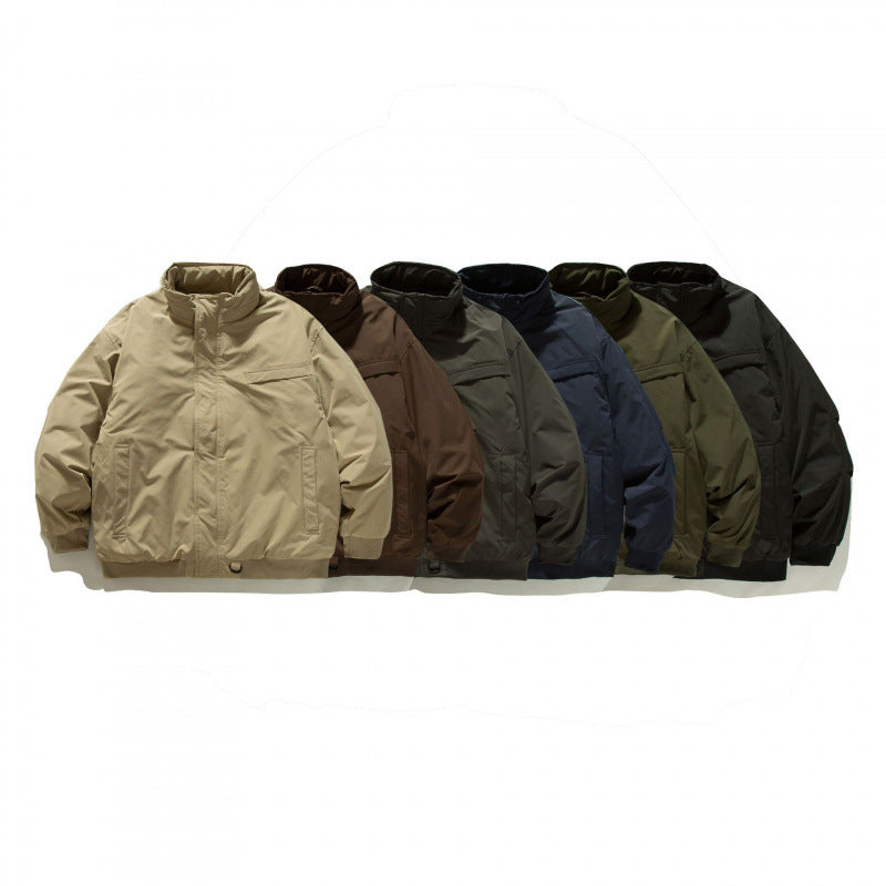 Unisex Boxy-padded transition jacket with high stand-up collar and utility pockets Amarae
