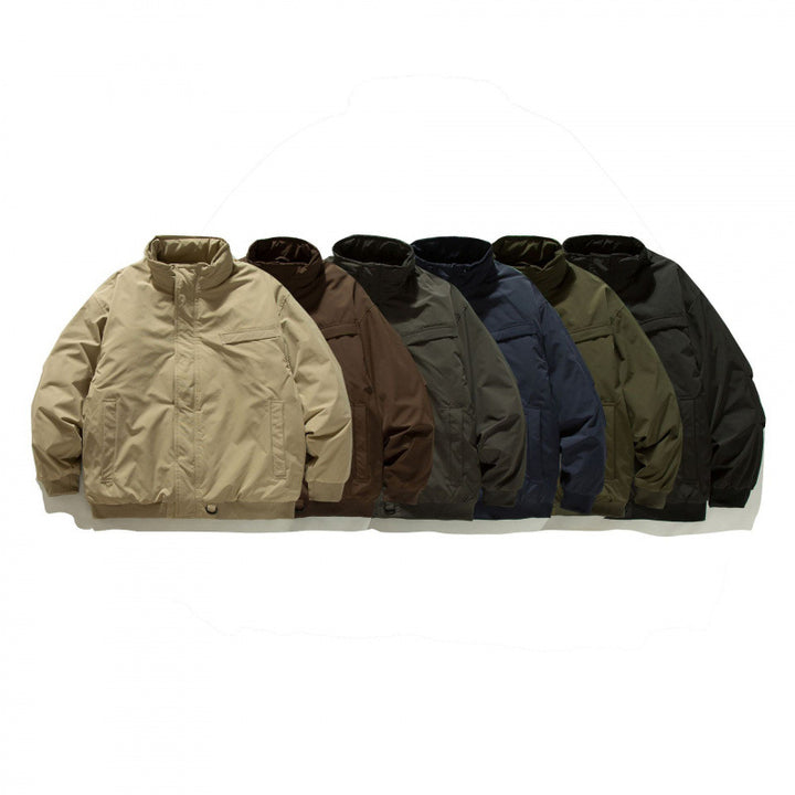 Unisex Boxy-padded transition jacket with high stand-up collar and utility pockets Amarae