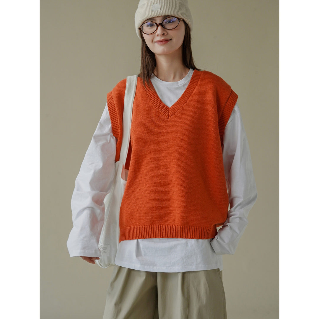 Women loosely cut sleeveless V-neck fine-knit vest with deep armhole and ribbed hem Amarae