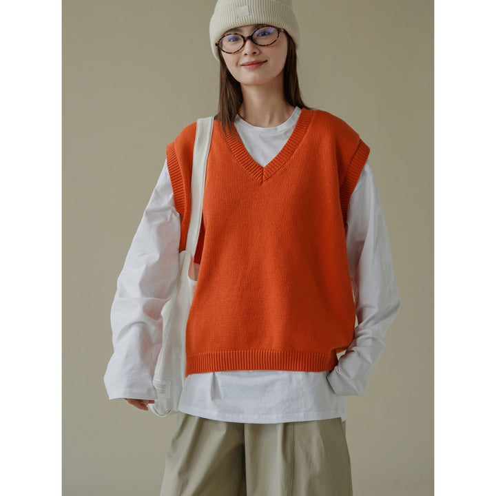 Women loosely cut sleeveless V-neck fine-knit vest with deep armhole and ribbed hem Amarae