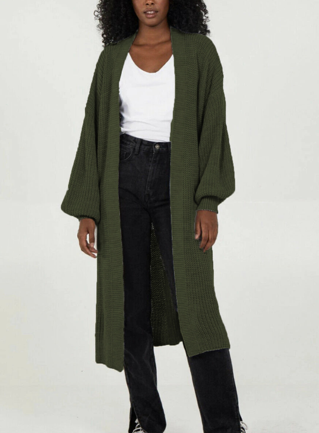 Plus size knitted cardigan for women with voluminous sleeves and an opening at the front Lune Londonl