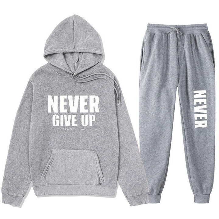 Women's training pullover and jogging pants in motif set with motivating print Chic & Stil