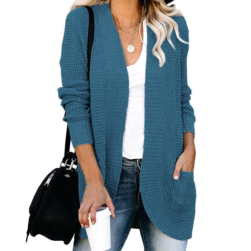 Women's knitted jacket with a loose fit and practical pockets Lune London