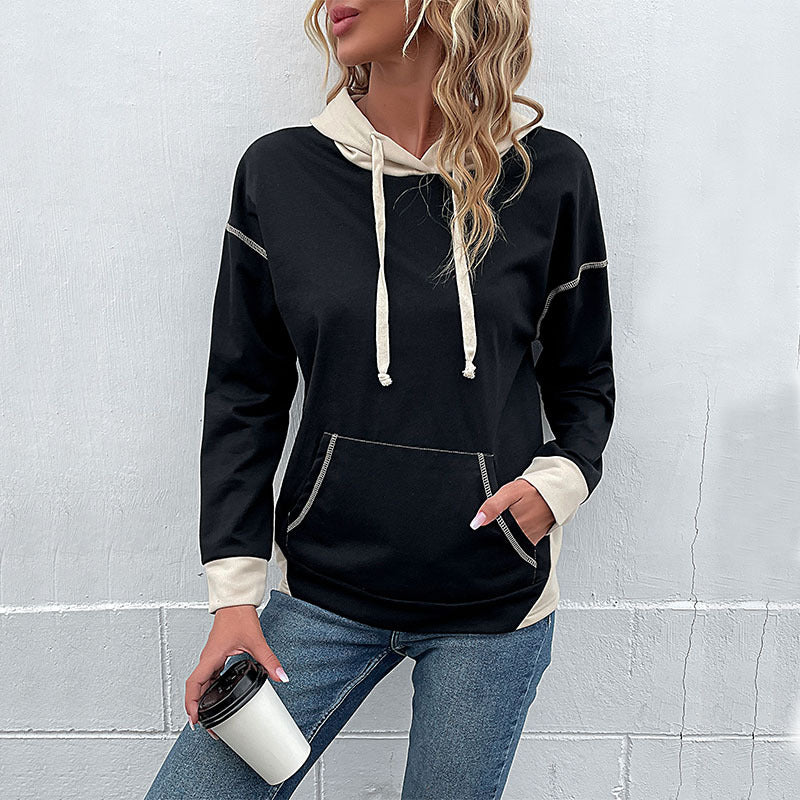 Casual hooded sweater for ladies with practical kangaroo pocket design Lune London