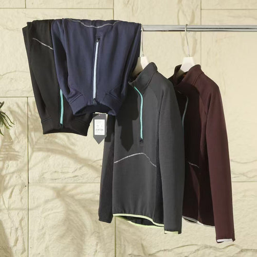 Top long à manches longues sportif pour femmes avec éléments de fermeture éclair pratiques Chic & Stil