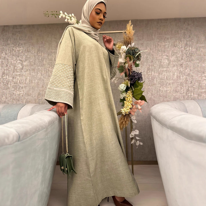 Elegant maxi dress for women with trendy trumpet sleeves and fine details Lune London