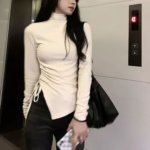 Women's long sleeve top with beautiful wrap design and high collar