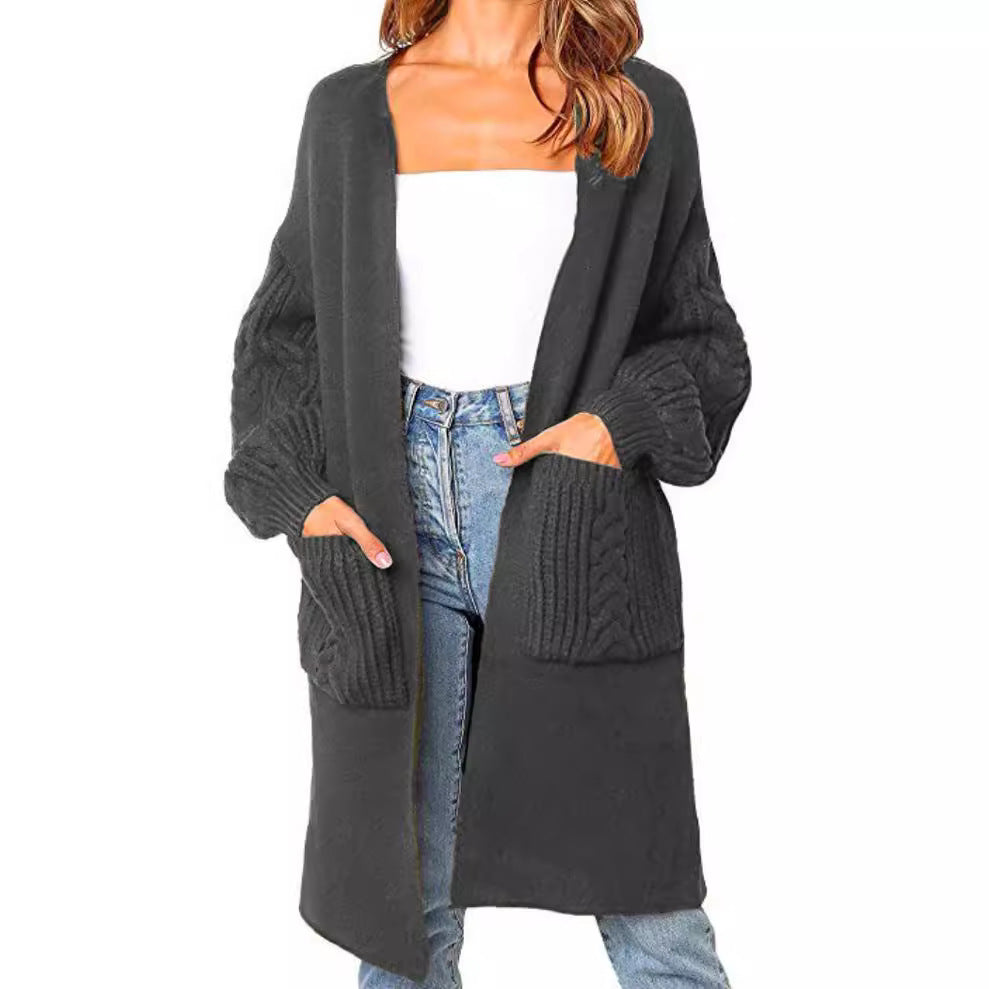 Knitted coat for women with deep V-neck and chunky knit details Lune London