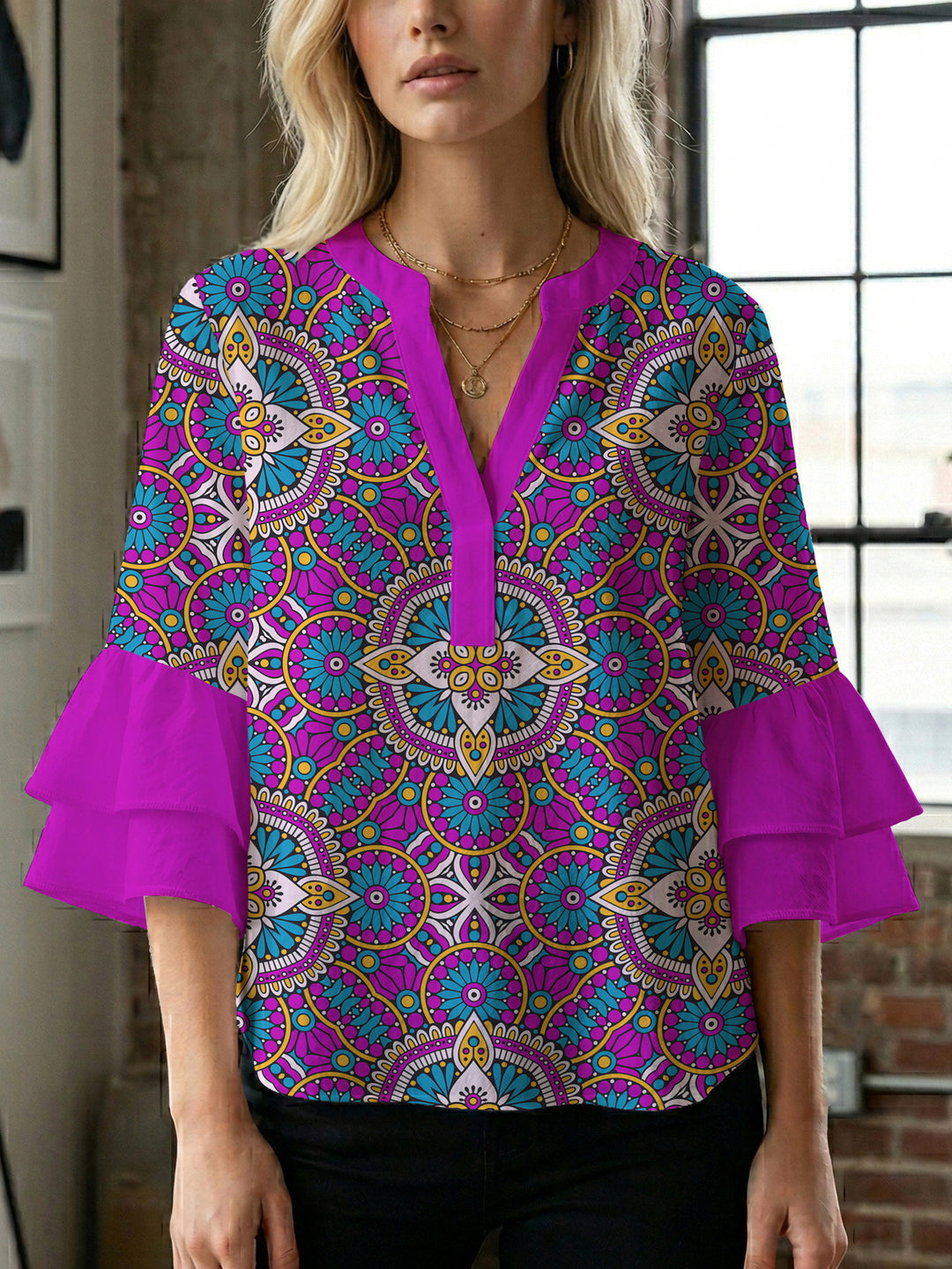 Ladies elegant top with voluminous ruffle hems and floral design Lune London