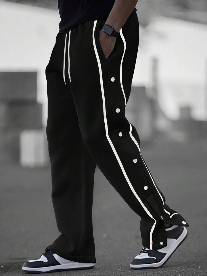 Stylish men's sports pants with snap button details and side pockets Lune London