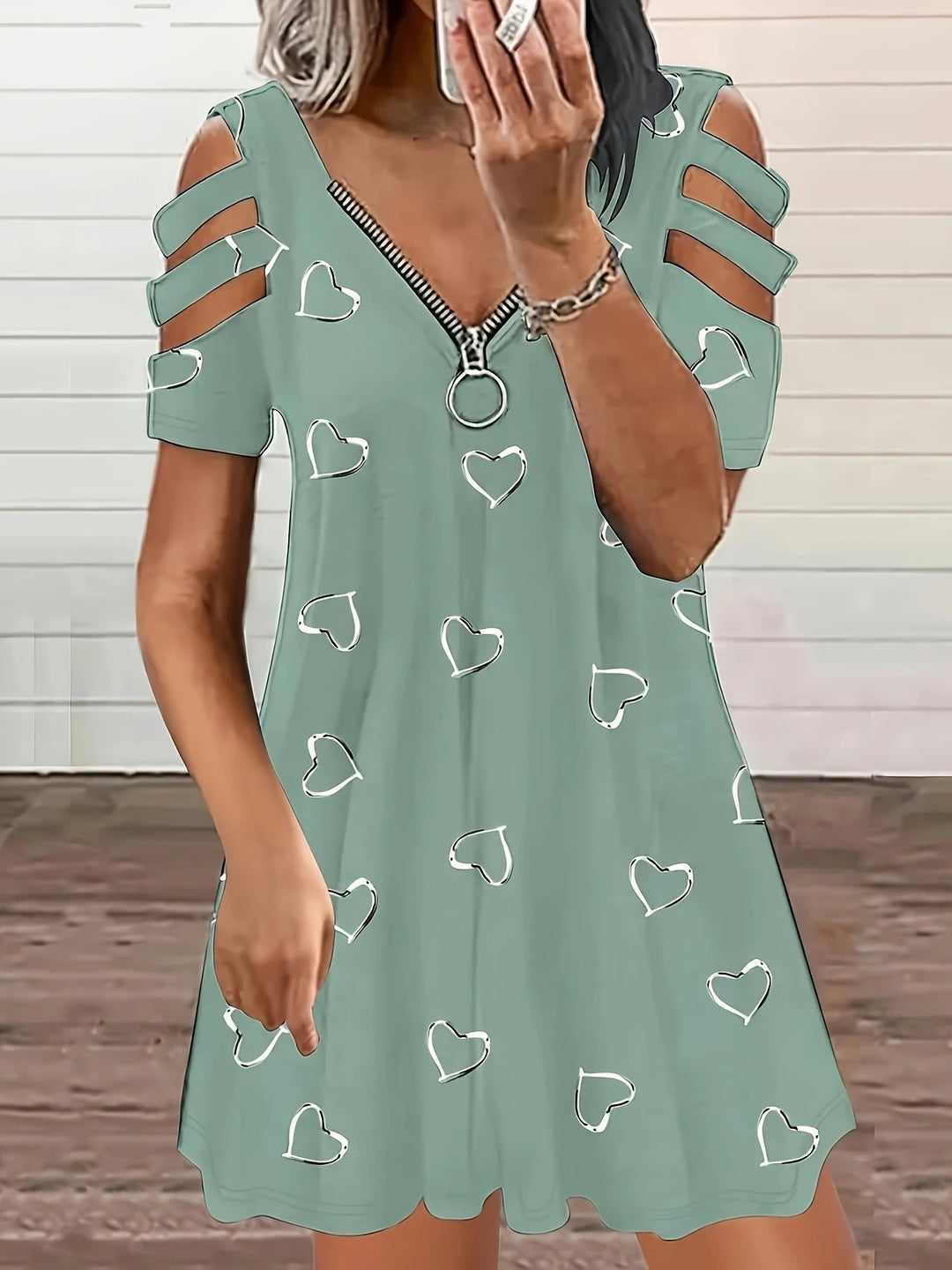 Casual dress for women with cut-out sleeves and heart pattern Lune London