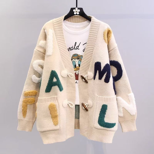Ladies chunky knit cardigan with colorful appliqués and large pockets Amarae