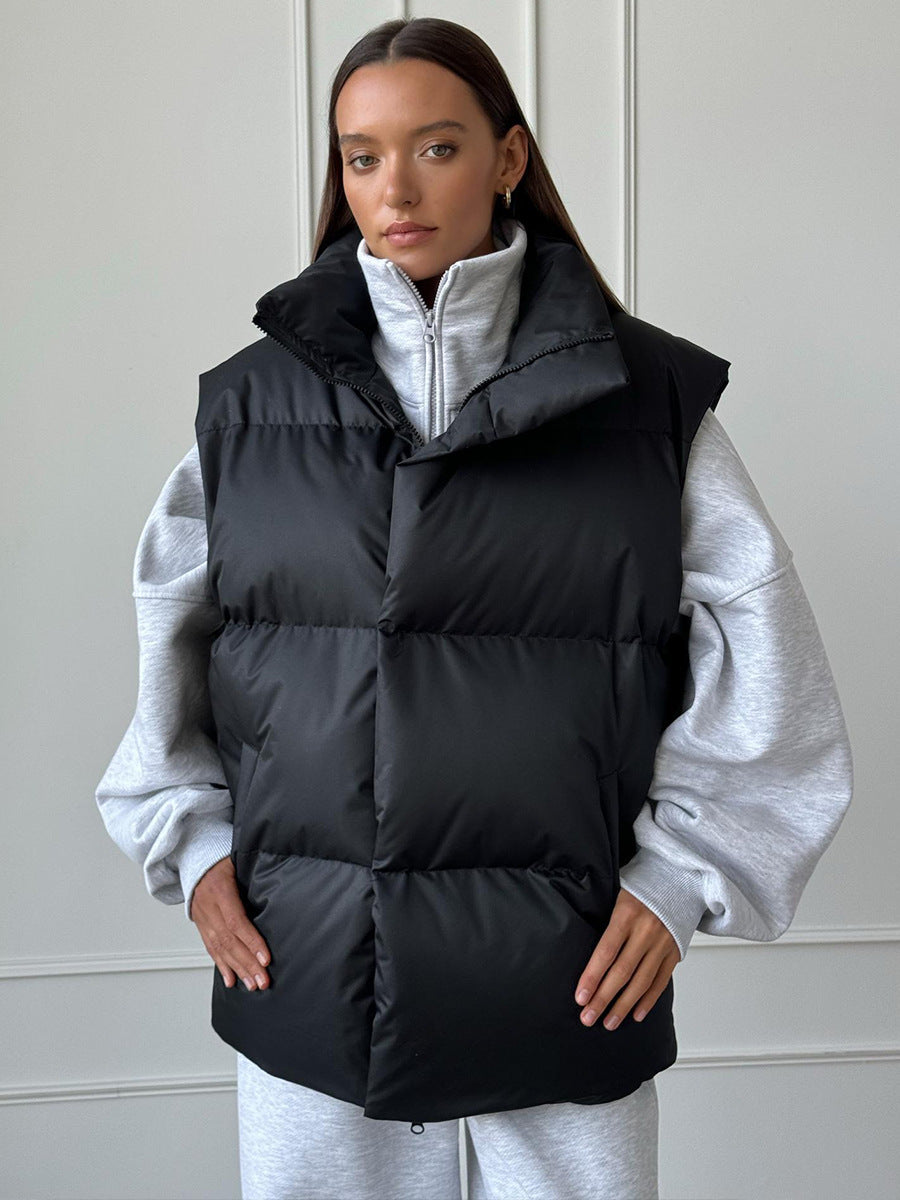 Ladies padded vest with high collar and practical side pockets Lune London