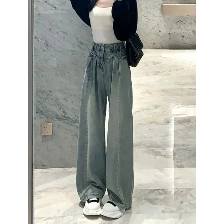 Jeans femmes taille haute à coupe large avec un design de ceinture élégant Chic & Stil