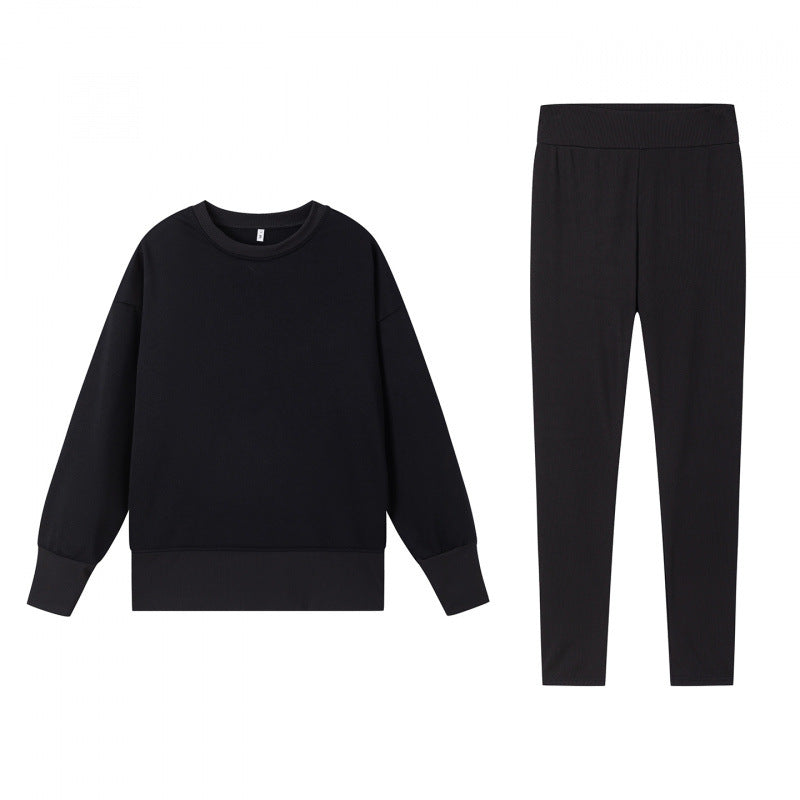 Ensemble de sport confortable pour femmes avec sweat-shirt ample et leggings ajustés Chic & Stil