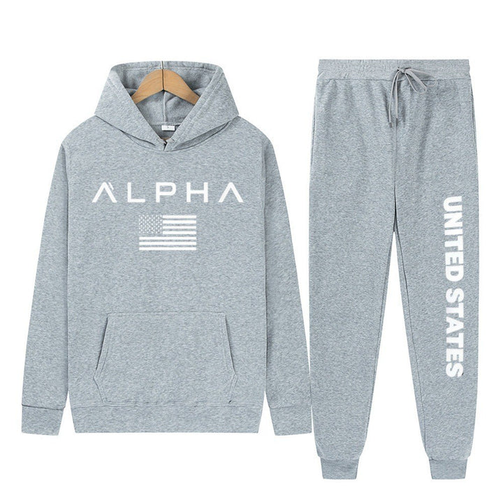 Women's hoodie and jogging pants set with creative front print and sporty cut Chic & Stil