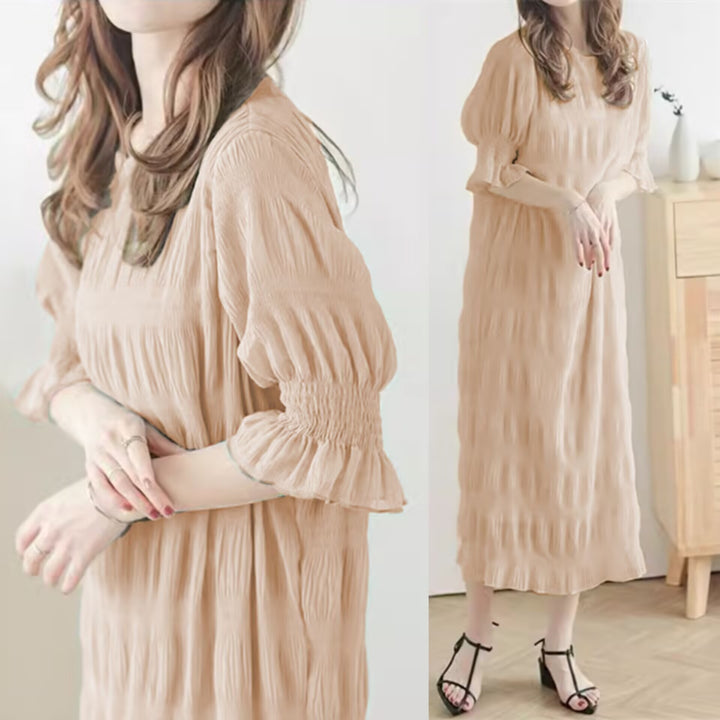 Casual maxi dress for women with elastic puff sleeves and a refined textured design Lune London